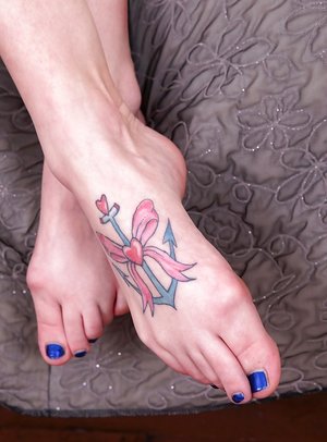 Cute blonde chick Chloe Delaure showing off sexy feet in high heeled shoes